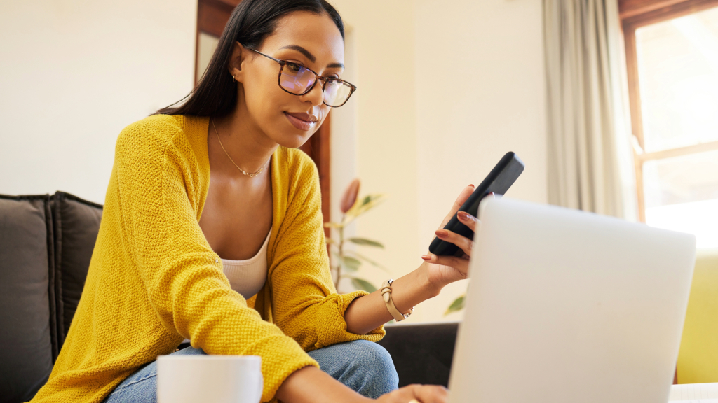 Young woman researching on computer